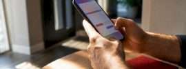 Concertgoer reviewing ticket payment options
