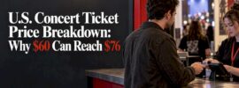 Concert fan paying at venue ticket counter